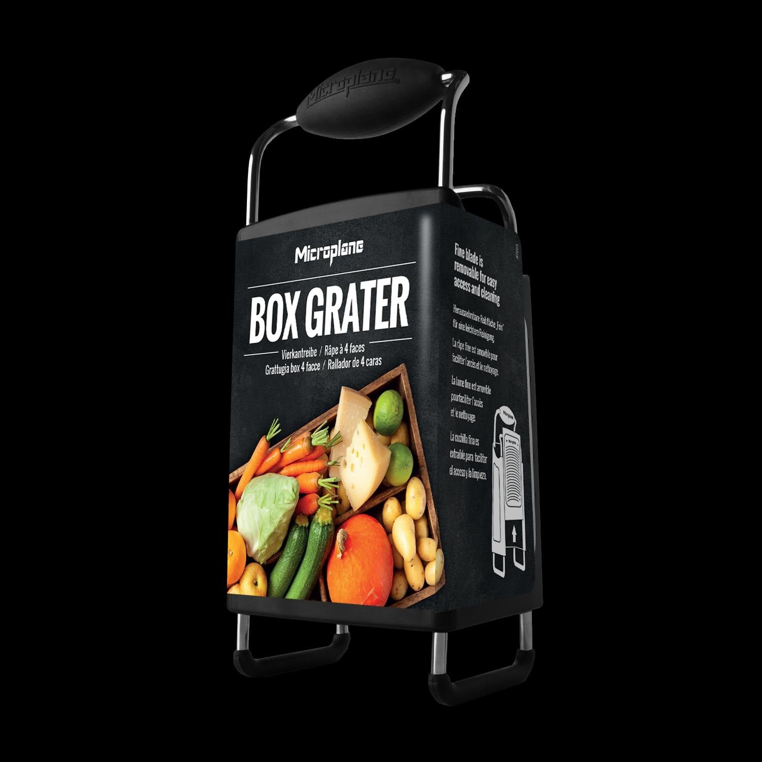 Verpackung der Microplane Vierkantreibe (Box Grater) mit Produktabbildung von Gemüse und Käse.